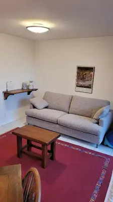 Ein Sitzbereich in der Unterkunft Apartment Grillon