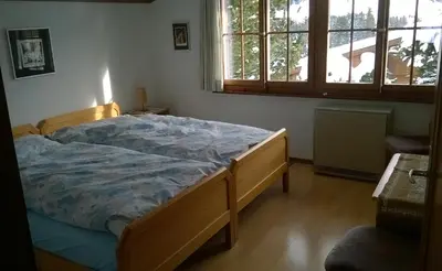 Ein Bett oder Betten in einem Zimmer der Unterkunft Chalet Petite Fleur