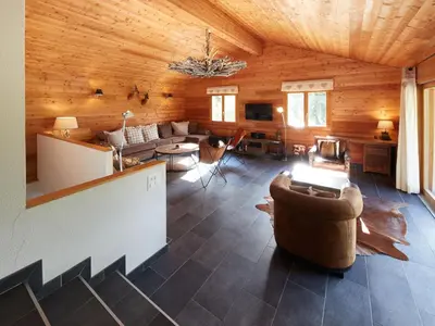 Ein Sitzbereich in der Unterkunft Chalet Hiboux by Interhome
