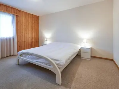 Ein Bett oder Betten in einem Zimmer der Unterkunft Apartment Sérandes 2 by Interhome