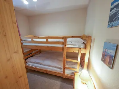Ein Bett oder Betten in einem Zimmer der Unterkunft Apartment Sérandes 2 by Interhome