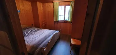 Ein Bett oder Betten in einem Zimmer der Unterkunft LUMA