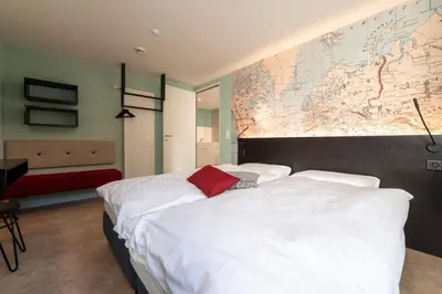 Ein Bett oder Betten in einem Zimmer der Unterkunft Emma's B&B LUNGERN - Self Check-in Hotel