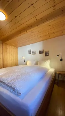 Ein Bett oder Betten in einem Zimmer der Unterkunft Bergquelle 1.OG