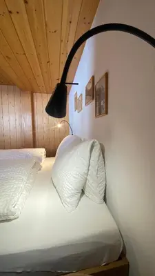 Ein Bett oder Betten in einem Zimmer der Unterkunft Bergquelle 1.OG