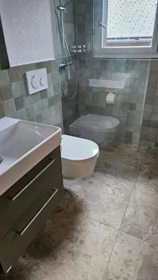 Ein Badezimmer in der Unterkunft Schöne Ferienwohnung Nr.26 im Haus Opal