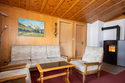 Ein Sitzbereich in der Unterkunft Chalet Iris