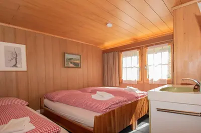 Ein Bett oder Betten in einem Zimmer der Unterkunft Chalet Iris