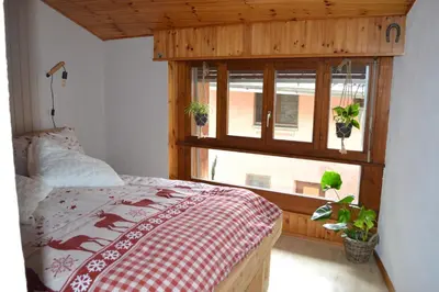 Ein Bett oder Betten in einem Zimmer der Unterkunft Chez Cathy chambre chez l'habitante