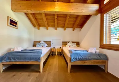 Ein Bett oder Betten in einem Zimmer der Unterkunft Silberhorn