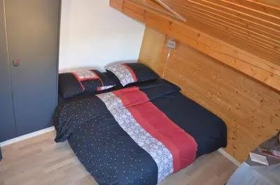 Ein Bett oder Betten in einem Zimmer der Unterkunft Logement chez l'habitant étage indépendant