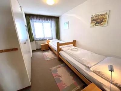 Ein Bett oder Betten in einem Zimmer der Unterkunft Lärchenwald 1706
