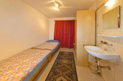 Ein Bett oder Betten in einem Zimmer der Unterkunft Schmiedstube 420
