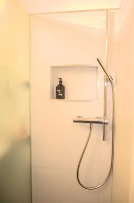 Ein Badezimmer in der Unterkunft CAYA Bijou im Herzen von Zermatt