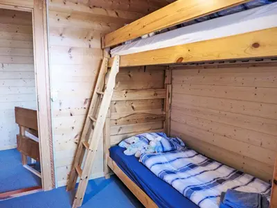 Ein Bett oder Betten in einem Zimmer der Unterkunft Holiday Home Chalet Ninette by Interhome