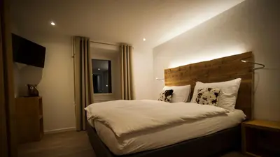 Ein Bett oder Betten in einem Zimmer der Unterkunft Pension de la Poste