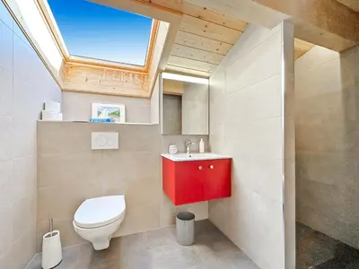 Ein Badezimmer in der Unterkunft Chalet Familial Les Girolles aux portes d'Anzère