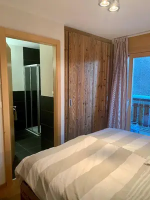 Ein Bett oder Betten in einem Zimmer der Unterkunft Ski-In, Ski-Out 4, Veysonnaz