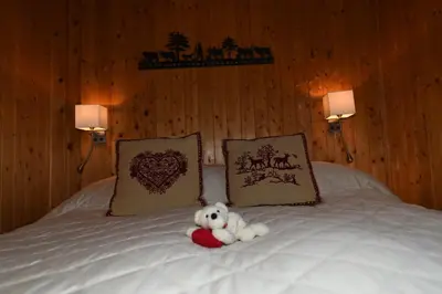 Ein Bett oder Betten in einem Zimmer der Unterkunft Chalet Mon Rêve