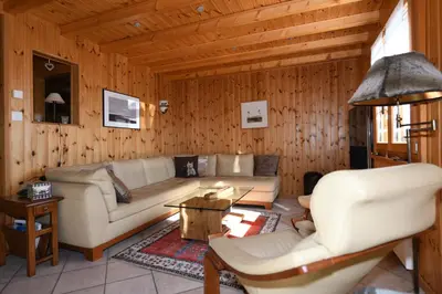 Ein Sitzbereich in der Unterkunft Chalet Mon Rêve