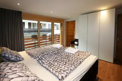 Ein Bett oder Betten in einem Zimmer der Unterkunft Derby ski-in/out