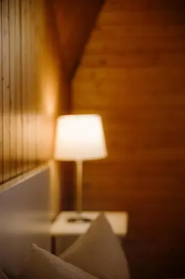 Ein Bett oder Betten in einem Zimmer der Unterkunft Berghotel Engstligenalp Adelboden