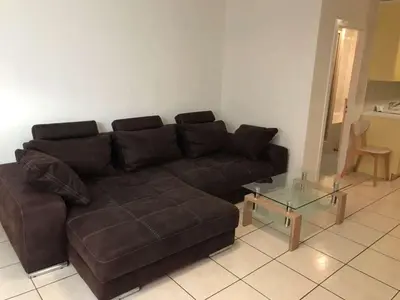 Ein Sitzbereich in der Unterkunft Apartment Sion Center
