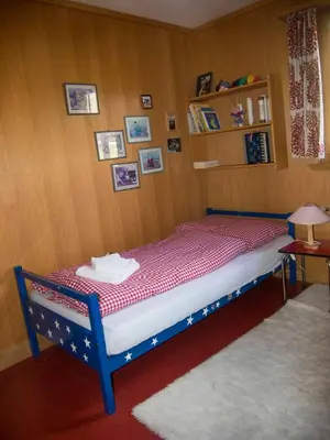 Ein Bett oder Betten in einem Zimmer der Unterkunft Chalet Sturmfang