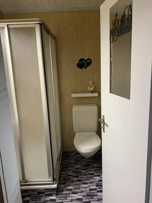 Ein Badezimmer in der Unterkunft Hotel Rössli