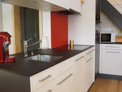 Küche/Küchenzeile in der Unterkunft Apartment Lischenhaus 2 - Wohnung Flösch by Interhome