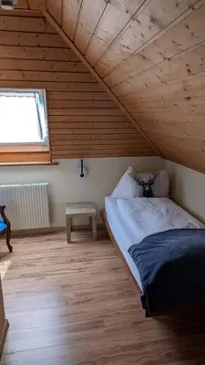 Ein Bett oder Betten in einem Zimmer der Unterkunft Hotel Harder Minerva