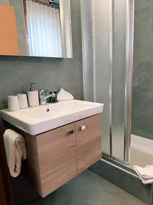 Ein Badezimmer in der Unterkunft Chalet Achat by Zermatt Premium Apartments