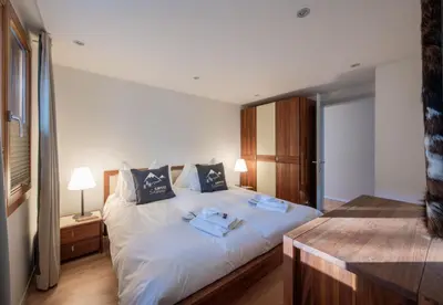 Ein Bett oder Betten in einem Zimmer der Unterkunft Chalet Waldschluecht