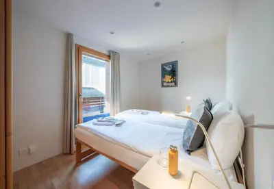Ein Bett oder Betten in einem Zimmer der Unterkunft Chalet Waldschluecht