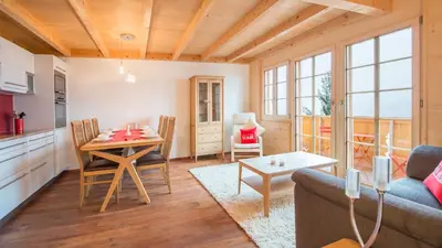 Ein Sitzbereich in der Unterkunft Chalet Aberot