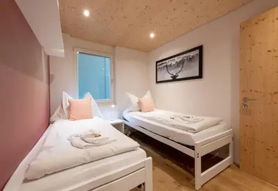 Ein Bett oder Betten in einem Zimmer der Unterkunft Chalet Am Acher