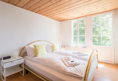 Ein Bett oder Betten in einem Zimmer der Unterkunft Chalet Hunnenfluh