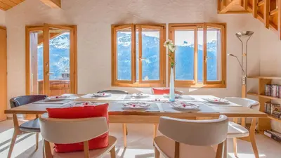 Ein Sitzbereich in der Unterkunft Chalet Millennium