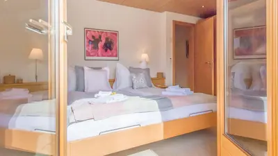 Ein Bett oder Betten in einem Zimmer der Unterkunft Chalet Millennium