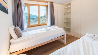 Ein Bett oder Betten in einem Zimmer der Unterkunft Panoramapark Soleil Chalet A