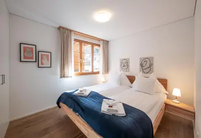 Ein Bett oder Betten in einem Zimmer der Unterkunft Panoramapark Soleil Chalet B