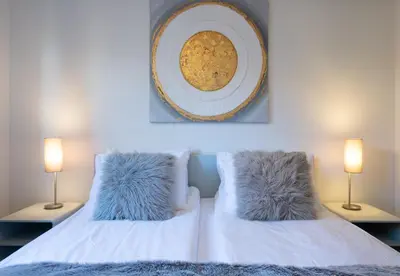 Ein Bett oder Betten in einem Zimmer der Unterkunft Panoramapark Soleil Chalet C