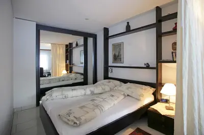 Ein Bett oder Betten in einem Zimmer der Unterkunft Baron / Baronesse Apartments