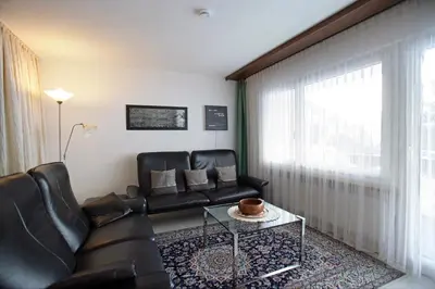 Ein Sitzbereich in der Unterkunft Baron / Baronesse Apartments