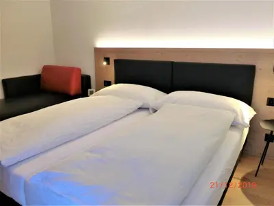 Ein Bett oder Betten in einem Zimmer der Unterkunft Chalet Raufthubel