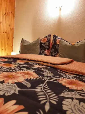 Ein Bett oder Betten in einem Zimmer der Unterkunft Bi de Furre