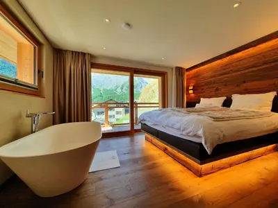 Ein Bett oder Betten in einem Zimmer der Unterkunft Luxury Chalet Engedi