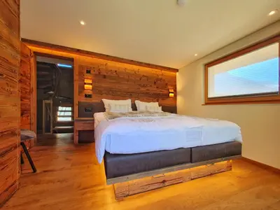 Ein Bett oder Betten in einem Zimmer der Unterkunft Luxury Chalet Engedi