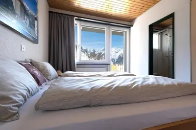 Ein Bett oder Betten in einem Zimmer der Unterkunft Panorama at Haus Waldheim! Nr 12