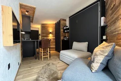Ein Sitzbereich in der Unterkunft Les Cerfs - Appartement & Studio - ANZERE